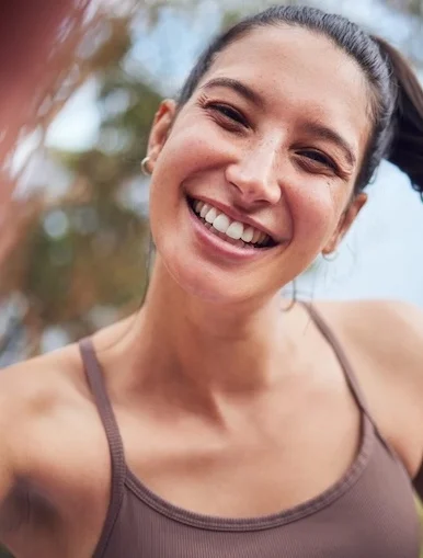 young woman working out without glasses