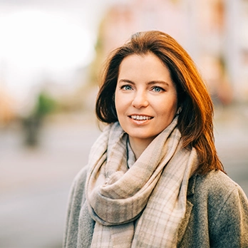 woman over 40 enjoying downtown city with clear vision